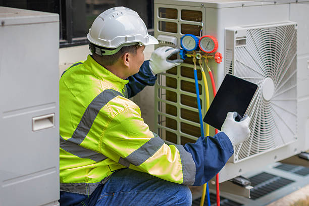 Professional Heat Pump Repair technician working in Sauquoit, NY